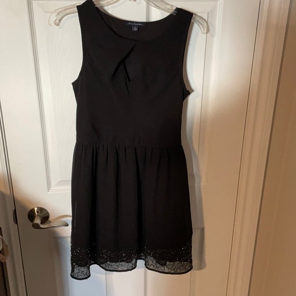 Black ae peephole dress. Super flattering. - Picture 1 of 5